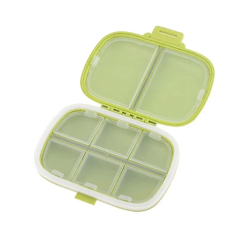 Compact and portable pill organiser with 8 compartments, perfect for Kiwi travellers to keep their daily vitamins and medications organised