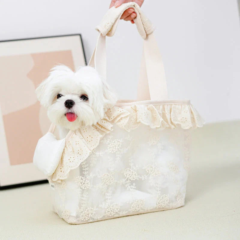 Stylish and comfortable puppy carrier bag made of lightweight nylon with a floral lace design, perfect for carrying small dogs on summer outings.