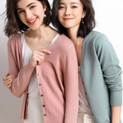 Stylish v-neck cardigan in various colors, featuring a flattering design and luxurious cashmere-rich composition for the modern Kiwi woman