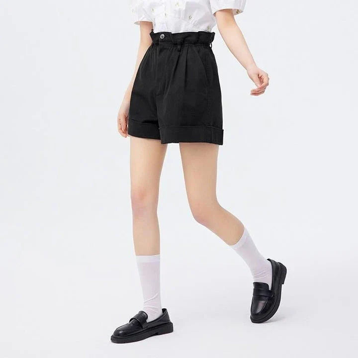 A pair of high-waisted, loose A-line casual shorts in a black colour, featuring a comfortable and flattering design for Kiwi women.