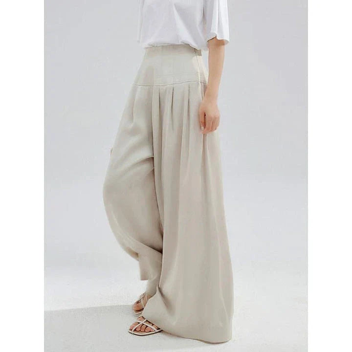 Stylish wide-leg trousers in a high-waist design, featuring a unique patchwork decoration for Kiwi women