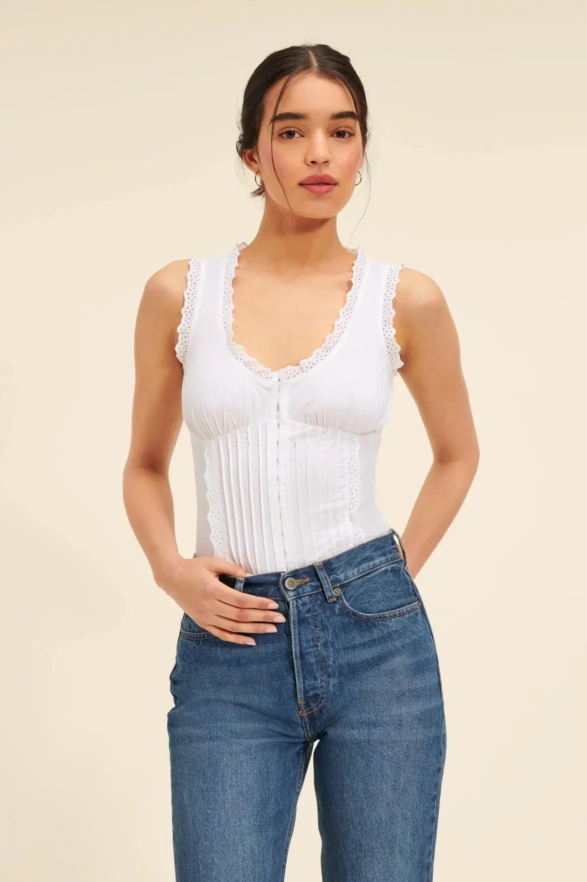 A stylish embroidered lace tank top with a sweet u-collar neckline, made from premium Kiwi-grown cotton.