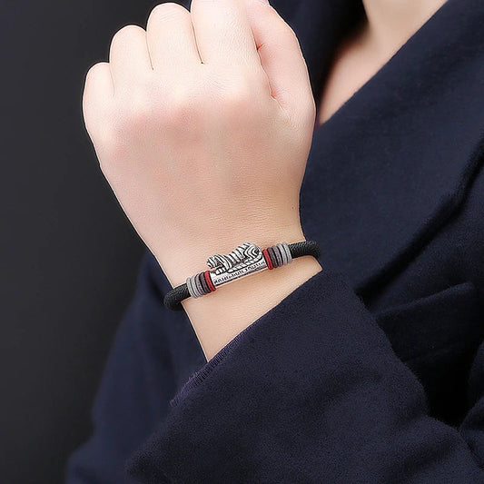 A handcrafted bracelet with a geometric design, made from premium silver materials for a durable and eco-friendly accessory.