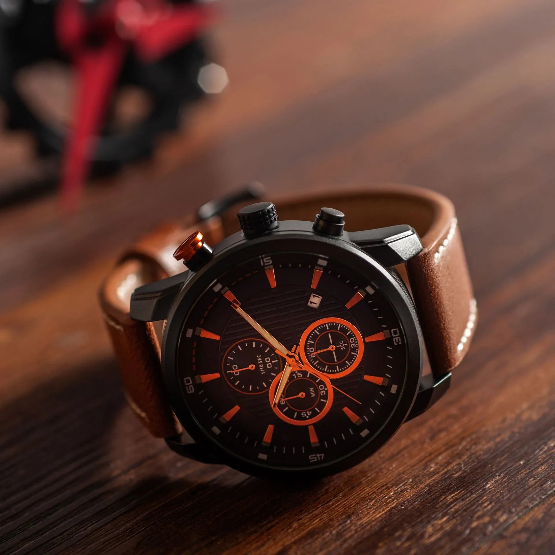 Stylish leather sports watch with single calendar movement and water-resistant alloy case