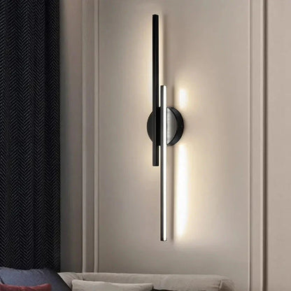 Stylish double linear LED wall light in black, creating warm and cosy ambience in a modern Kiwi home