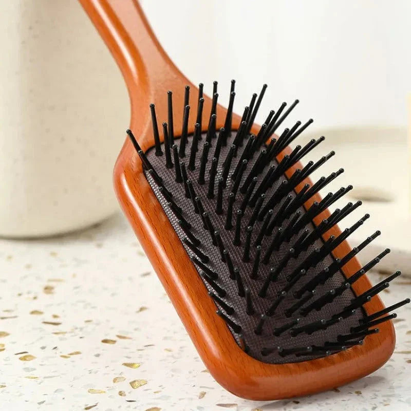 Anti-static wooden air cushion hair brush with scalp-massaging action, designed for healthy, beautiful hair