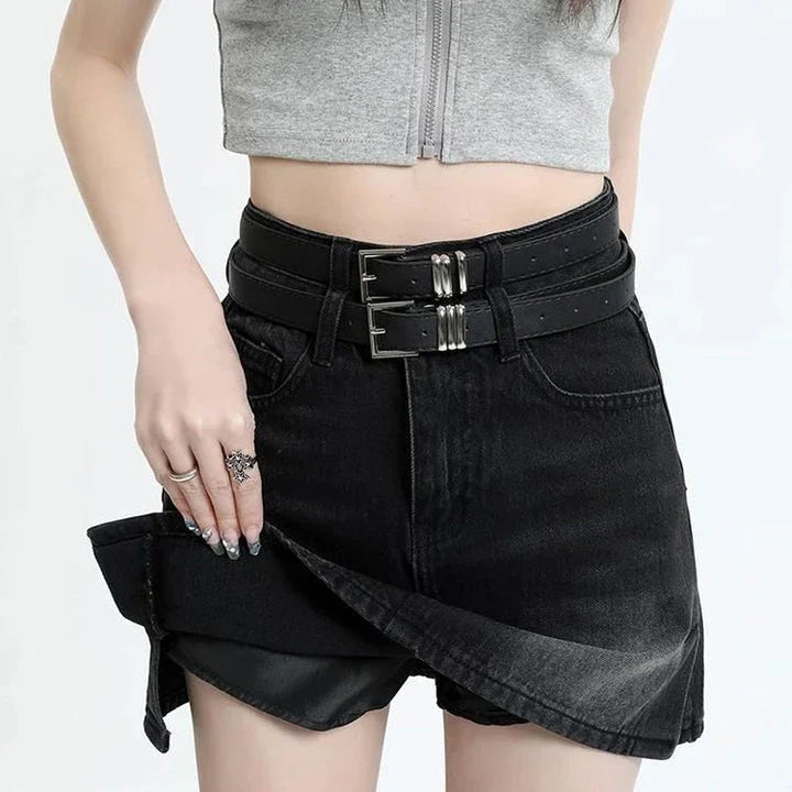 A stylish high-waisted denim mini skirt with a fashionable belt, perfect for Kiwi fashion enthusiasts