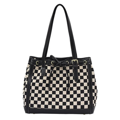 Black PU leather tote bag with a classic checkerboard pattern, perfect for everyday use in the Kiwi lifestyle