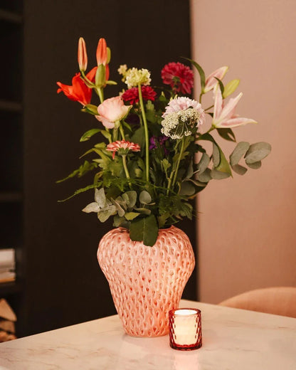 Stylish strawberry-shaped ceramic vase in various colors and sizes, perfect for adding Kiwi charm to your home decor
