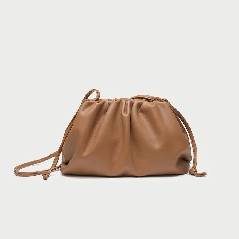 Elegant soft PU leather crossbody bag in a timeless brown colour, featuring a versatile design and premium quality construction.