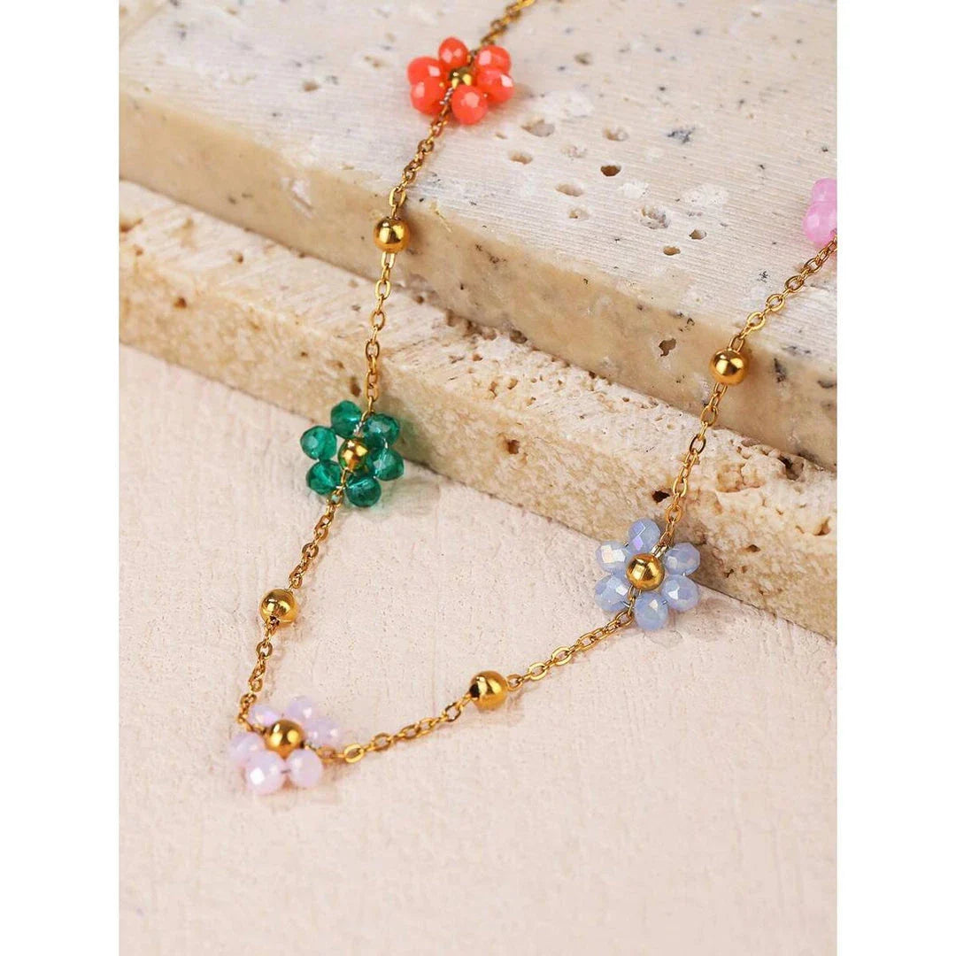 Vibrant, colorful flower-beaded stainless steel bracelet with adjustable chain and link design