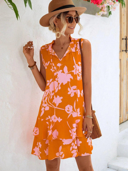 Stylish floral dress with tie neck and sleeveless design, perfect for everyday wear in New Zealand