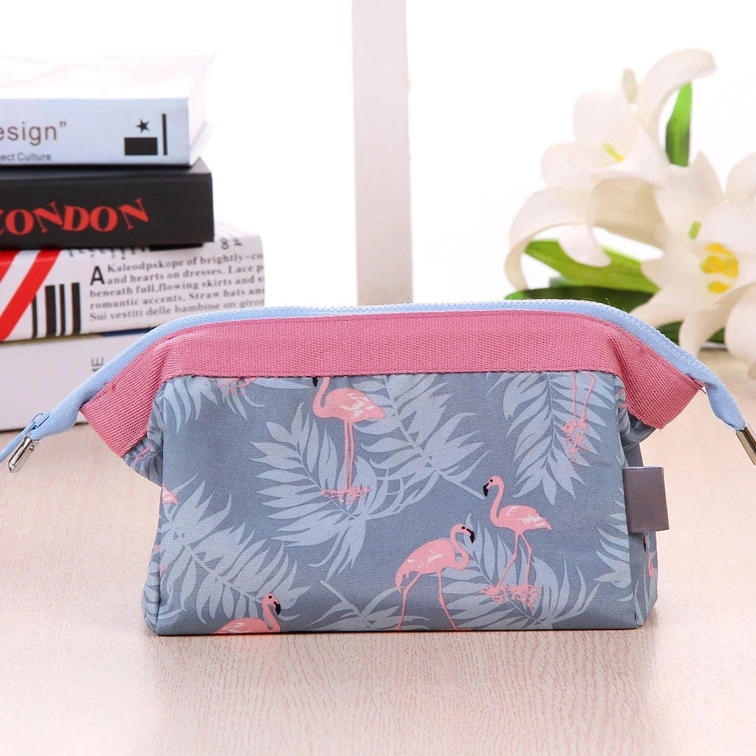 Flamingo-patterned travel makeup and toiletry bag with spacious interior and convenient storage pockets