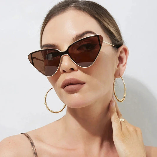 Stylish metal cat-eye sunglasses with premium alloy frames and polycarbonate lenses, offering UV400 protection and a trendy, fashionable look for the discerning Kiwi consumer.