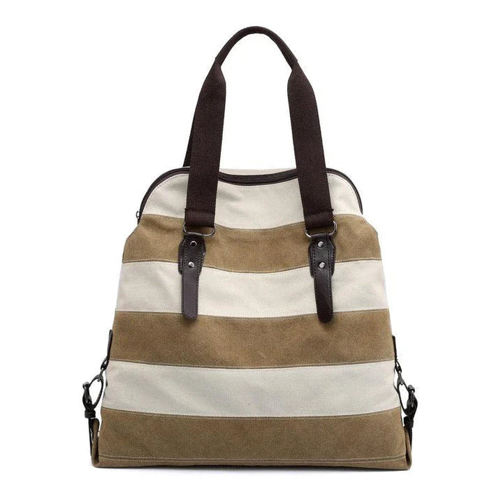 Stylish and practical Kiwi-crafted canvas tote bag with roomy interior, durable polyester lining, and adjustable shoulder straps