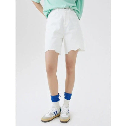 100% cotton A-line Bermuda denim shorts with unique wave cut decoration, available in a versatile solid white color