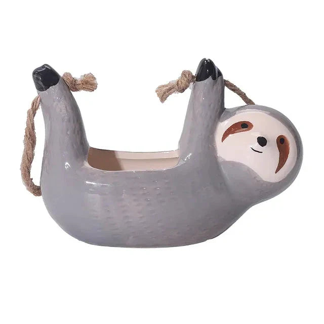 Ceramic Cartoon Animal Hanging Plant Pot with unique design and vibrant colours, perfect for adding personality to indoor spaces.