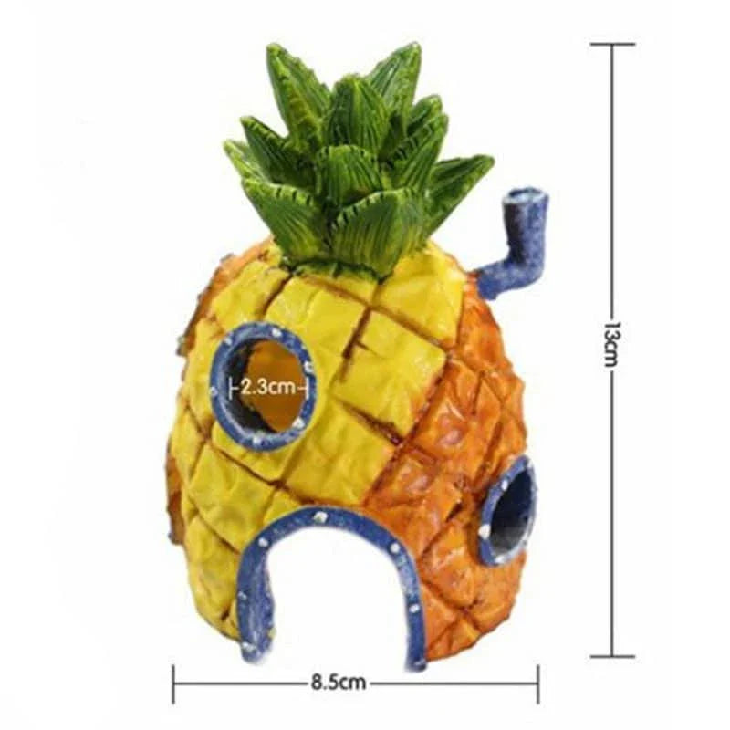 Wooden pineapple aquarium decorations adding tropical flair to an underwater display