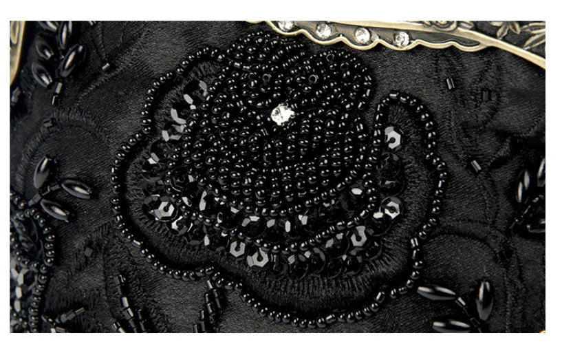 Bead embroidered fashion bag with silk surface, nylon exterior, and magnetic buckle closure