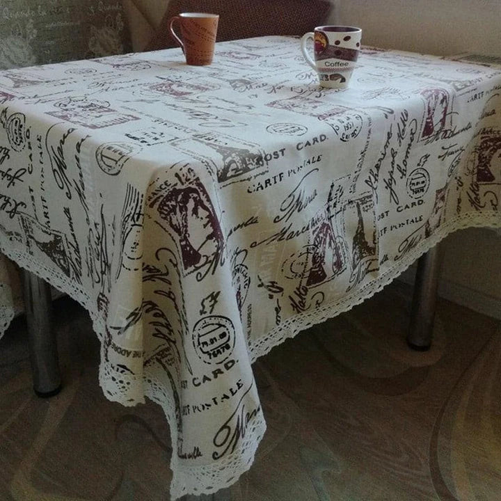 Elegant Paris-themed cotton and linen tablecloth with a delicate pattern, perfect for transforming your dining space