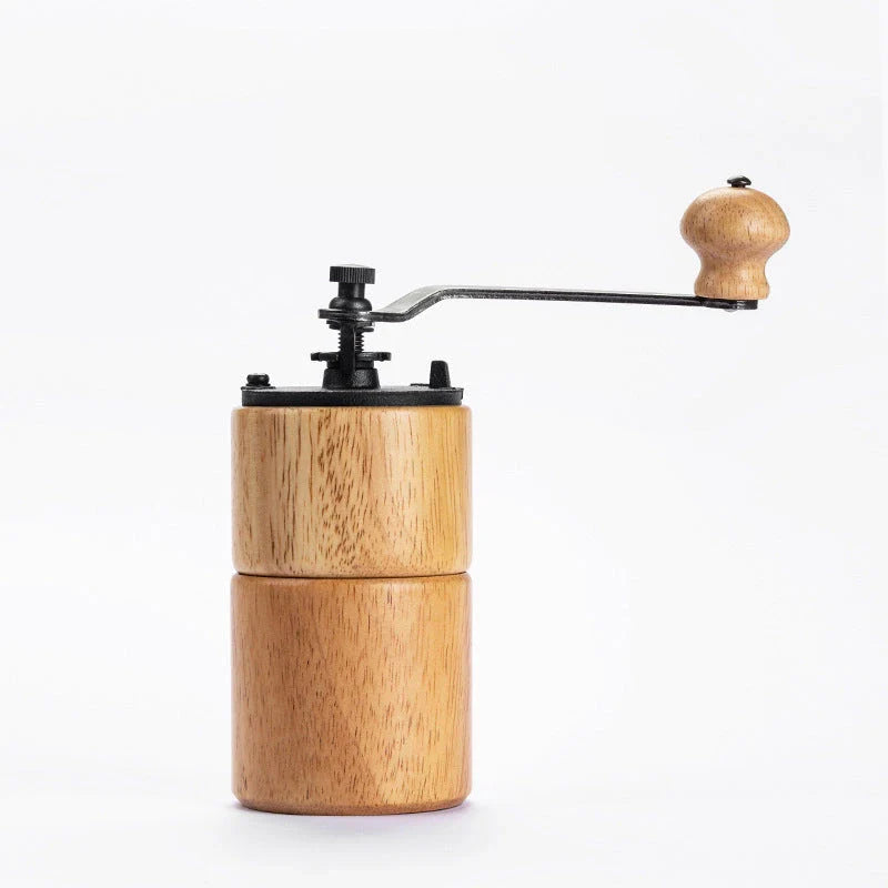 Elegant wooden manual coffee grinder with premium steel conical burr for consistent grinding and optimal coffee flavour.