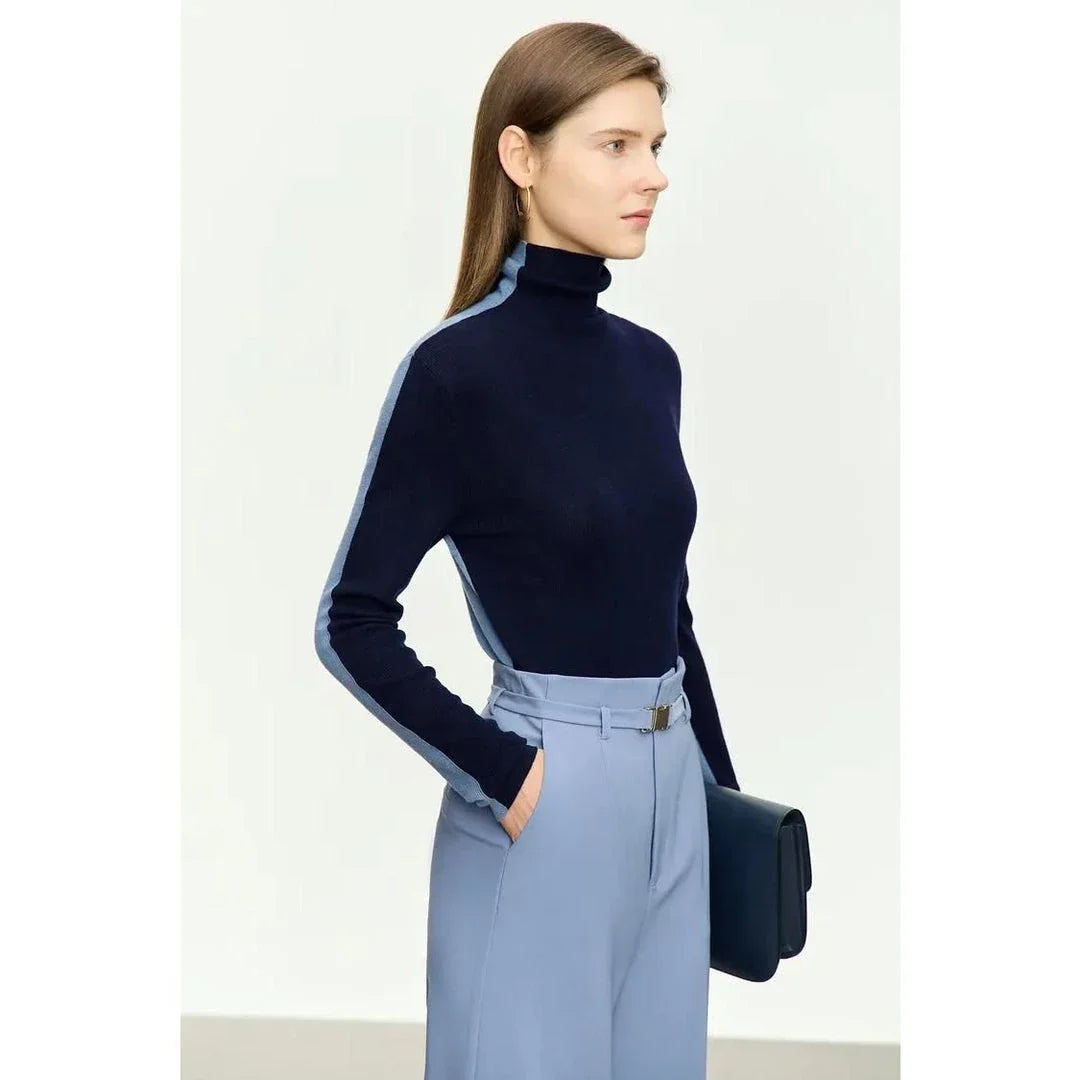 Elegant patchwork turtleneck sweater with a slim fit design, featuring a unique pattern and high-quality blend of materials for a stylish and comfortable look.