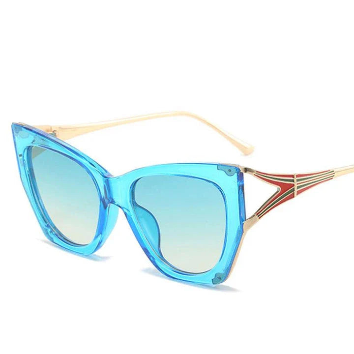 Fashionable blue gradient cat eye sunglasses with UV400 protection and a sleek metal frame