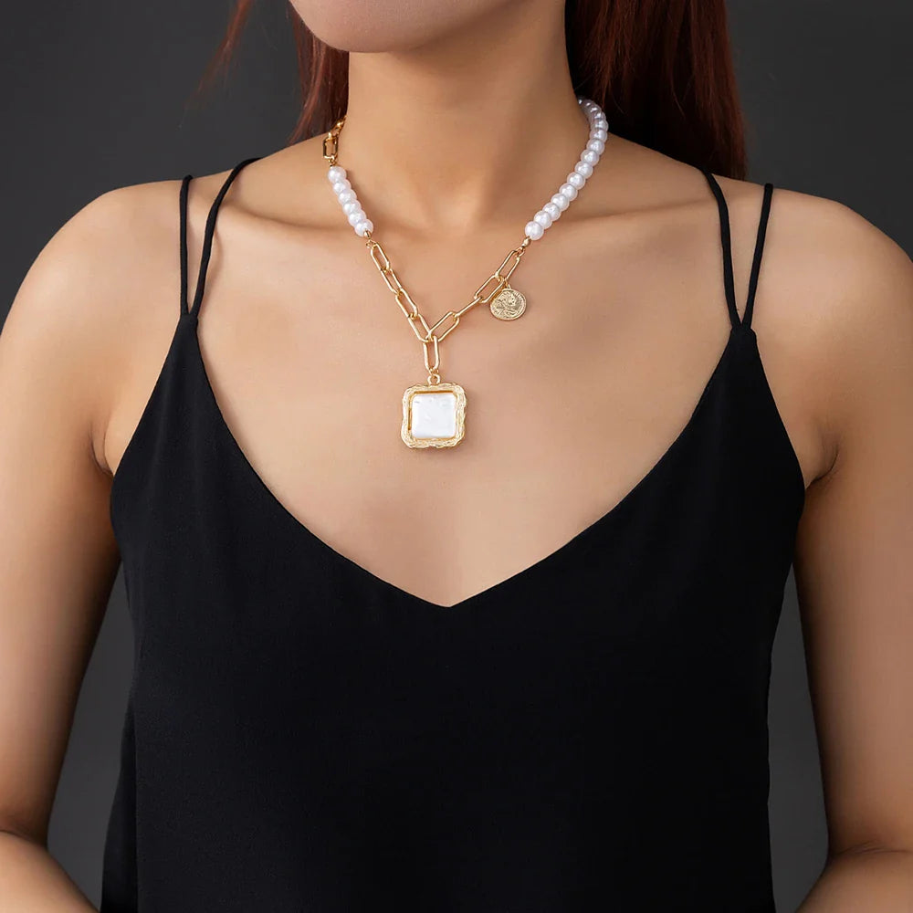 A beautiful faux baroque pearl necklace with an adjustable length and a polished, vintage-inspired design