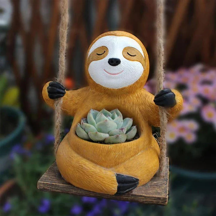 Charming Hanging Sloth Planter in resin material with a vibrant, glossy finish for home and garden decor