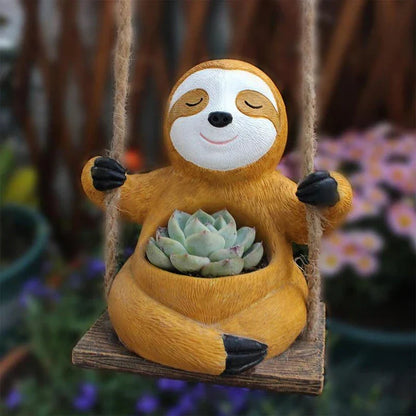 Charming Hanging Sloth Planter in resin material with a vibrant, glossy finish for home and garden decor