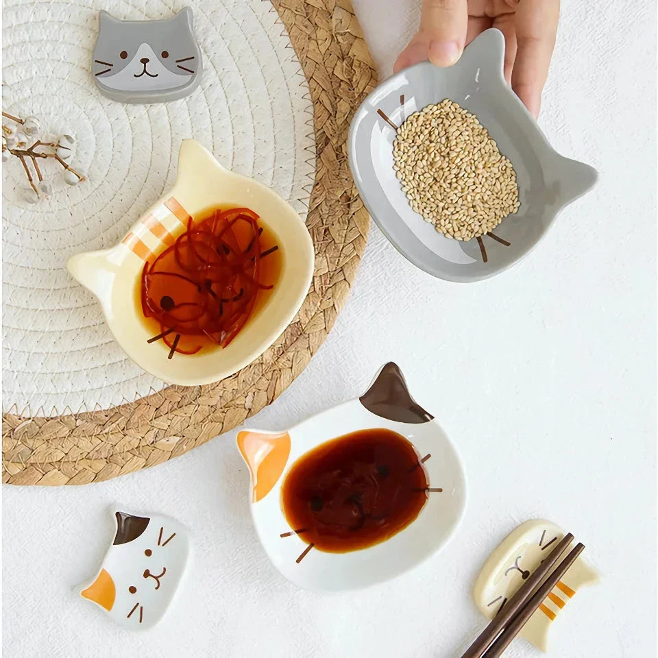 Charming Japanese-style ceramic condiment dish with a playful cat design, perfect for serving sauces, dips, and small snacks.