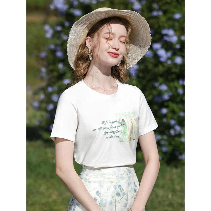 Embroidered casual summer tee for women in white with elegant graphic pattern