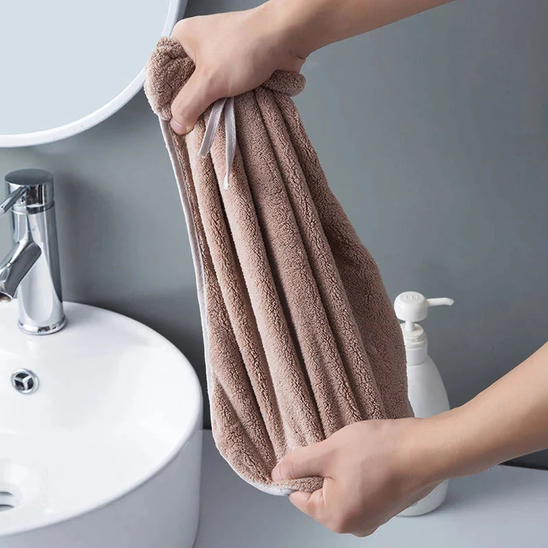 Soft, absorbent coral velvet hand towels with a unique bow design, perfect for Kiwi homes