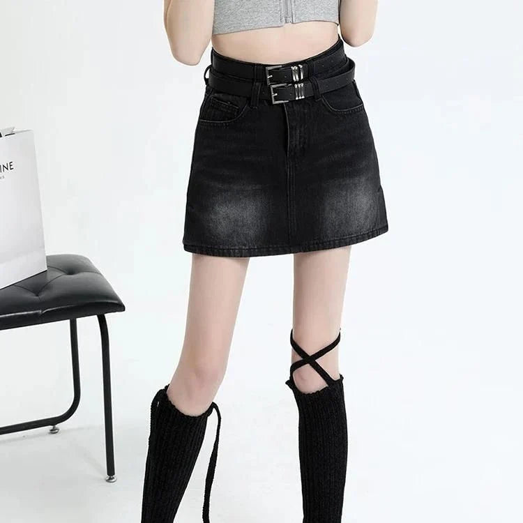 A stylish high-waisted denim mini skirt with a fashionable belt, perfect for Kiwi fashion enthusiasts