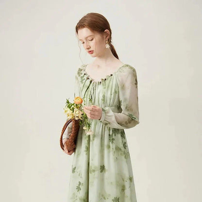 Elegant Kiwi-Inspired Romantic Dress with full-length sleeves, empire waistline, and A-line silhouette