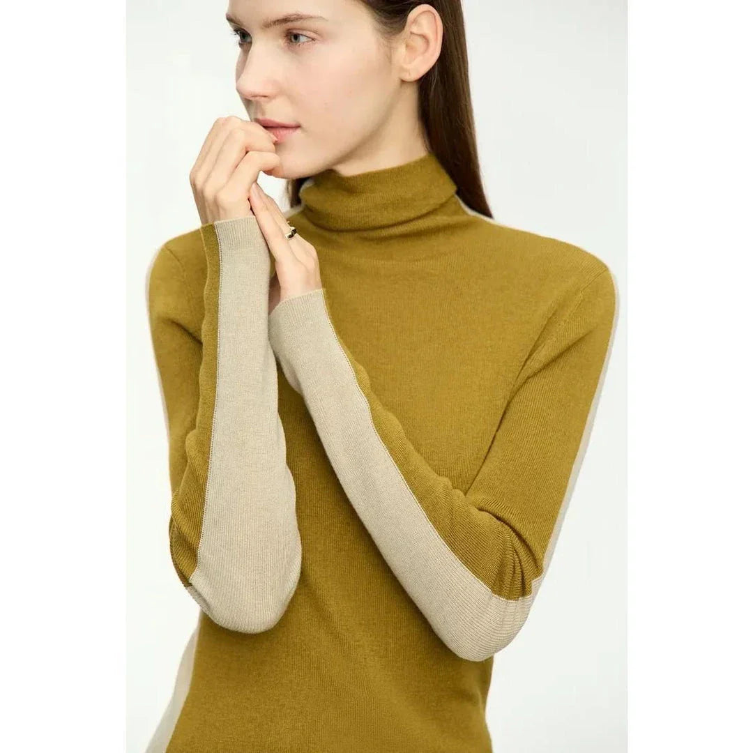 Elegant patchwork turtleneck sweater with a slim fit design, featuring a unique pattern and high-quality blend of materials for a stylish and comfortable look.