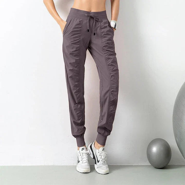 Comfortable and versatile sports pants for active Kiwi women, featuring a relaxed fit, drawstring waist, and convenient pockets.