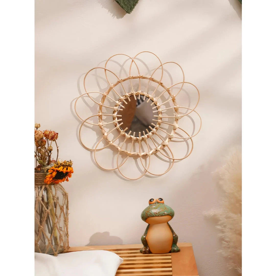 Handmade rattan wall mirror with a flower-shaped design, adding natural elegance to a Kiwi home decor