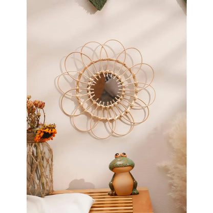 Handmade rattan wall mirror with a flower-shaped design, adding natural elegance to a Kiwi home decor