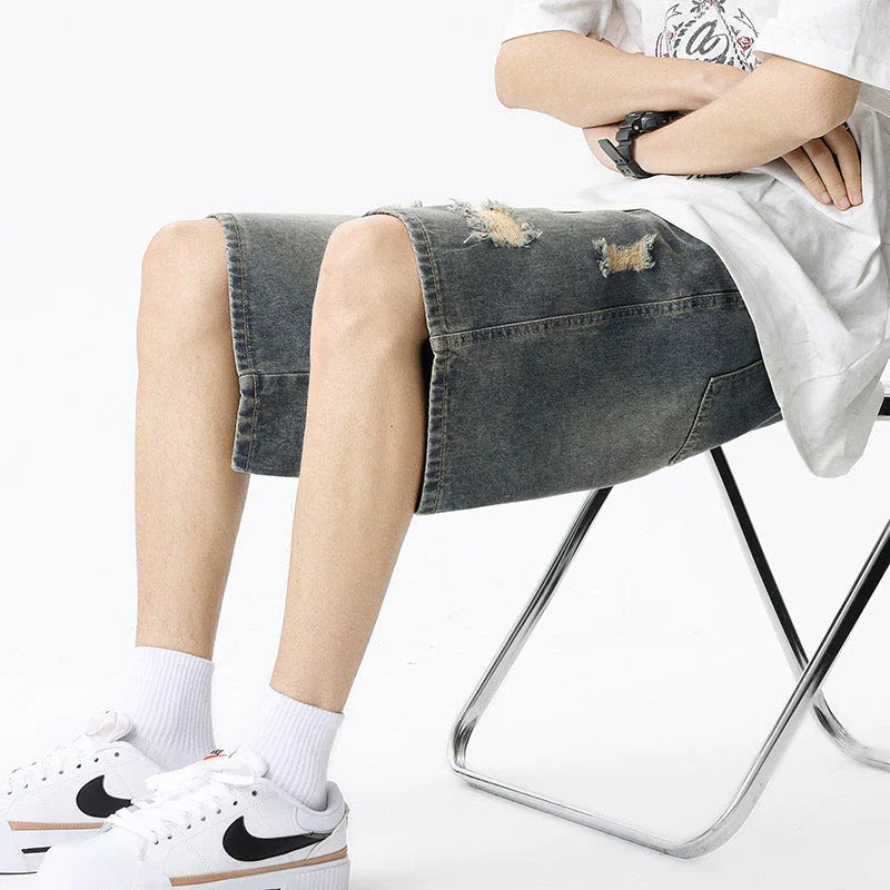 Sustainable Kiwi-made denim shorts in a classic straight-leg silhouette with a vintage wash