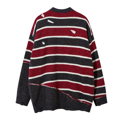 A vibrant red pullover sweater with an eye-catching patchwork stripe pattern, a cozy and stylish Kiwi wardrobe essential.