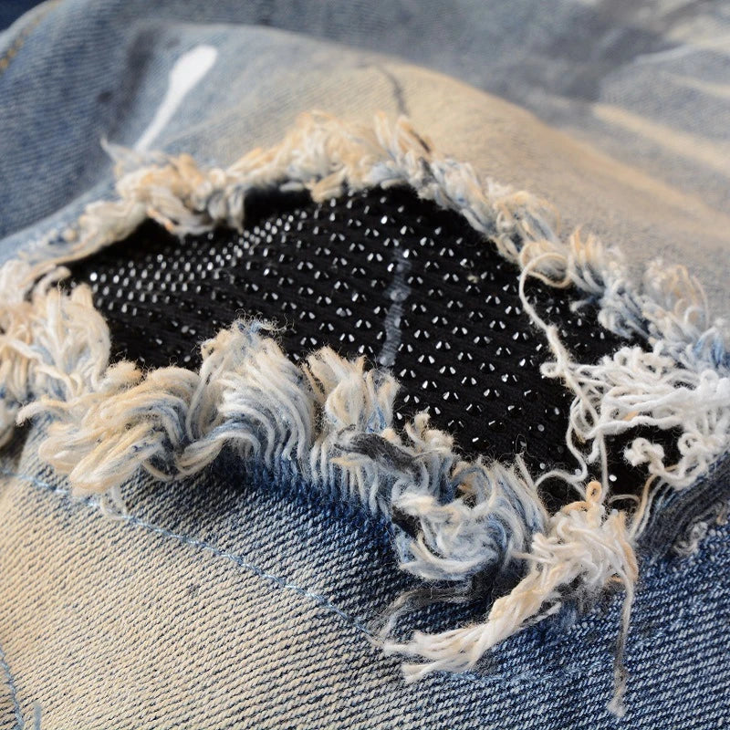 Vintage-inspired jeans with rhinestone and ink splash detailing, perfect for the modern Kiwi lifestyle