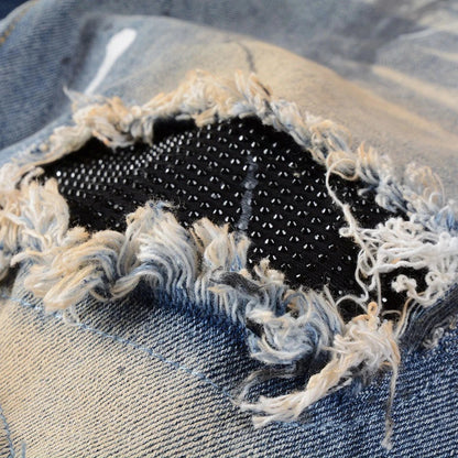 Vintage-inspired jeans with rhinestone and ink splash detailing, perfect for the modern Kiwi lifestyle