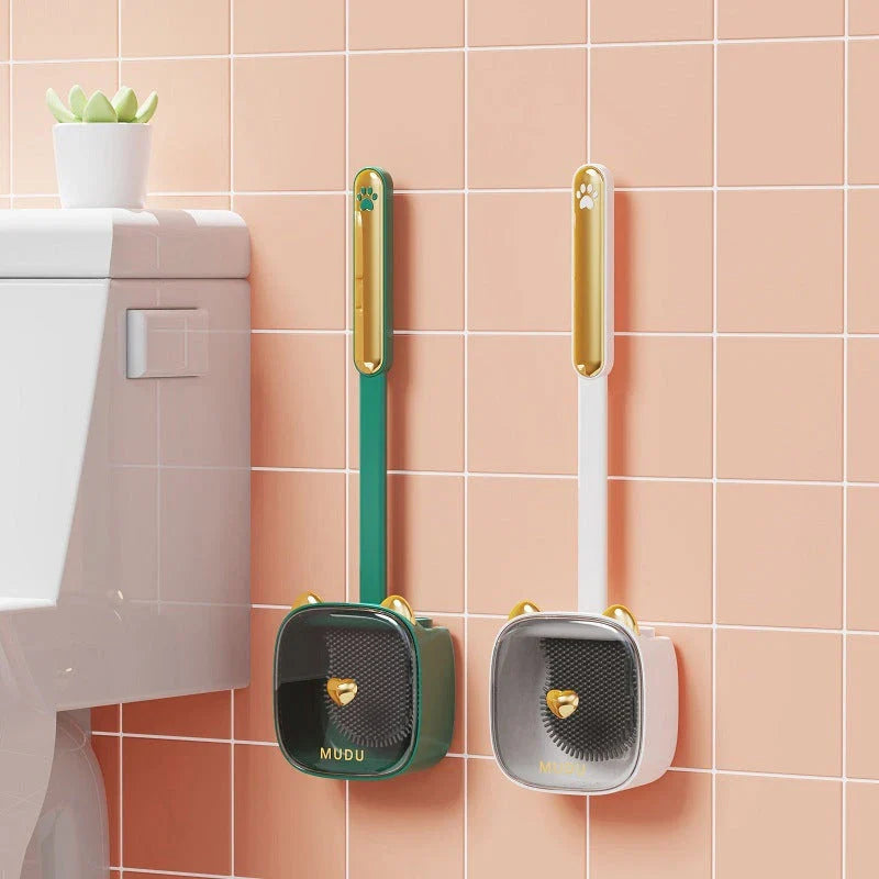 Stylish cat-themed wall-mounted toilet brush set with flexible silicone bristles for efficient cleaning in the Kiwi bathroom