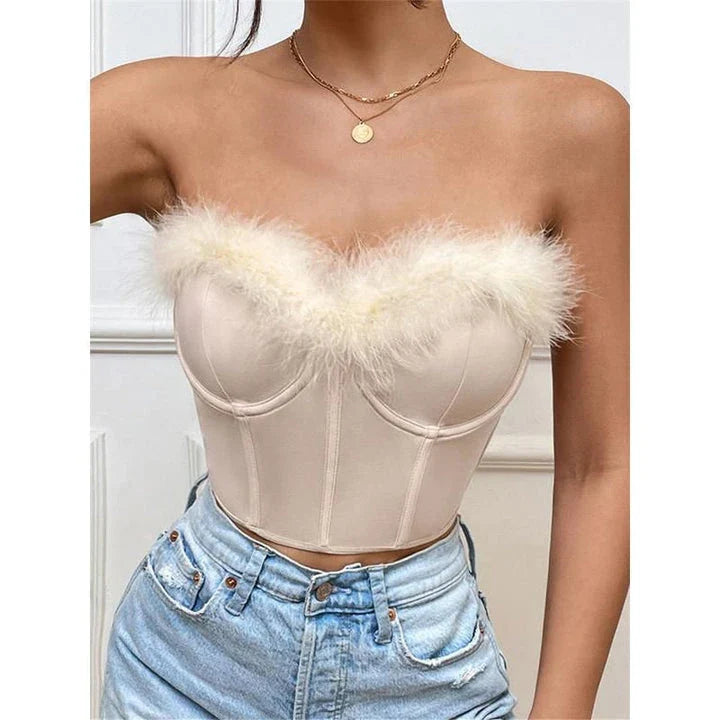 A stylish furry trim corset top in a flattering fit, perfect for adding a touch of glamour to any outfit.