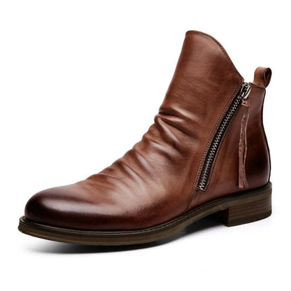 Premium Kiwi-crafted Chelsea boots with sleek, pointed toe and comfortable low heel for versatile casual wear