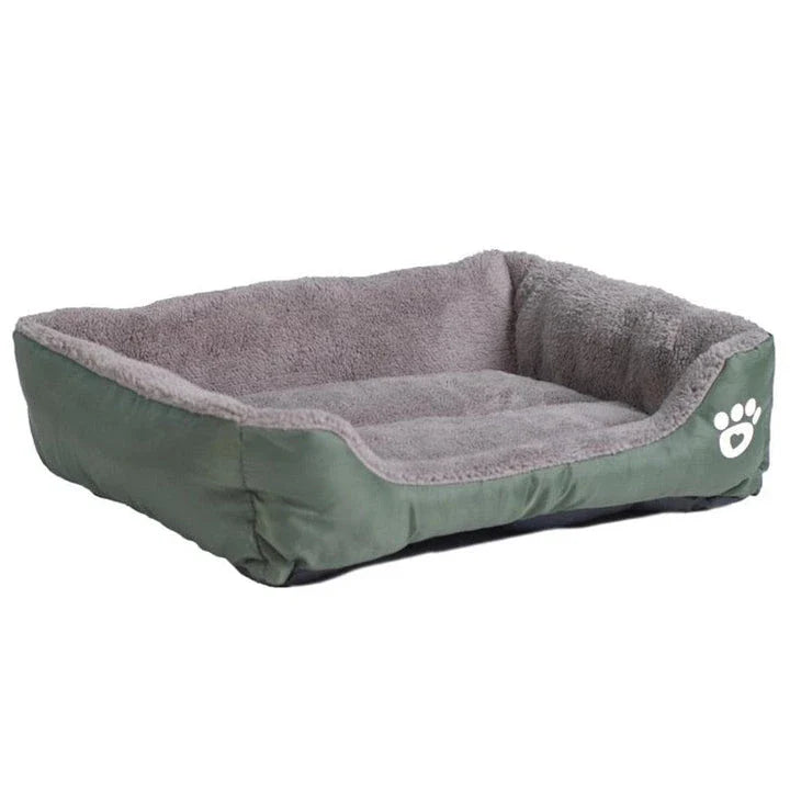 A cozy, waterproof pet bed featuring a soft fleece lining and paw print design, perfect for providing comfort and support for your beloved companion.