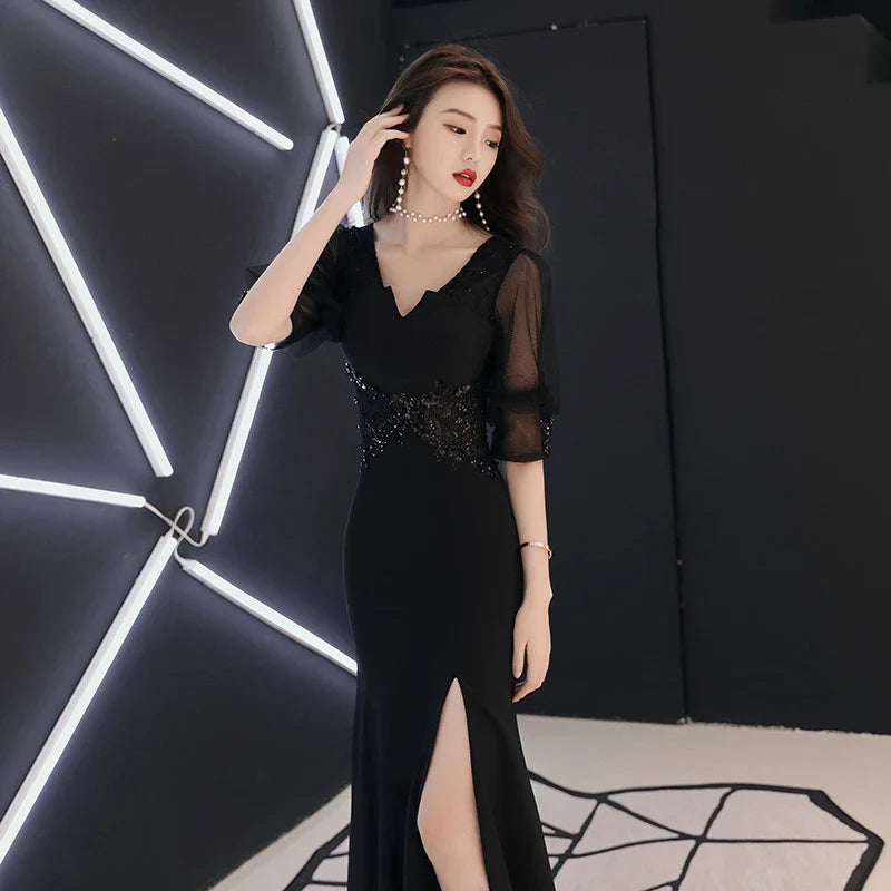 Stunning black evening dress with middle sleeves, perfect for formal events and special occasions in New Zealand