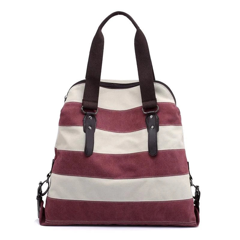 Stylish and practical Kiwi-crafted canvas tote bag with roomy interior, durable polyester lining, and adjustable shoulder straps