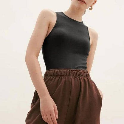 Stylish summer bodycon tank top for Kiwi women, featuring a comfortable and flattering design in a classic beige color.